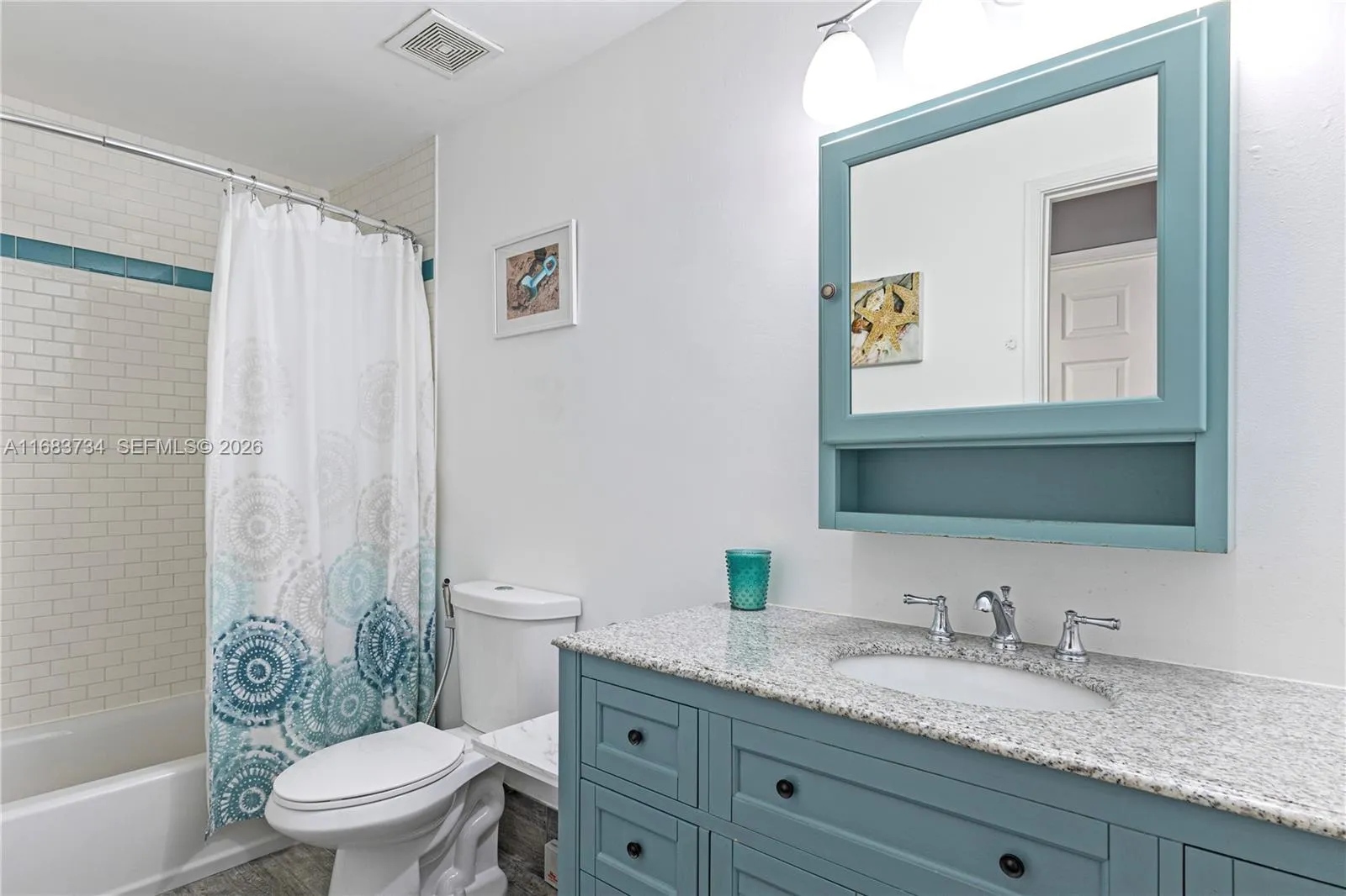 Updated Bathroom with shower/tub combination.651 Okeechobee Blvd., Unit #202, West Palm Beach, FL. City Place Tower Condominium. For Sale.