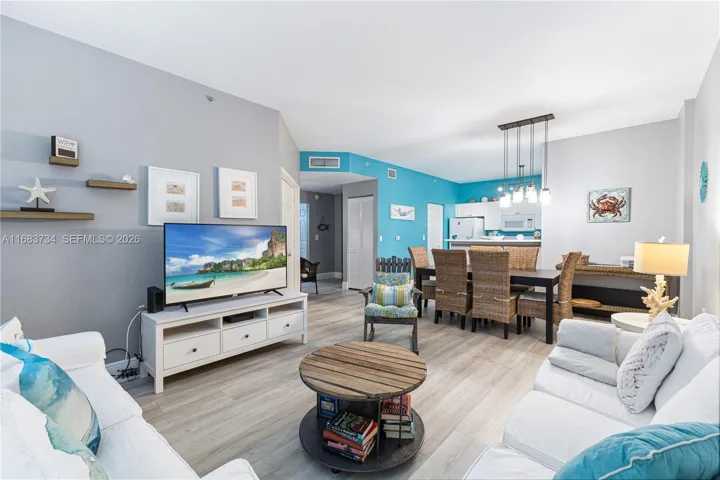 Spacious Living- and Dining Room with Open Kitchen. Ideal to relax or host friends and family.651 Okeechobee Blvd., Unit #202, West Palm Beach, FL. City Place Tower Condominium. For Sale.