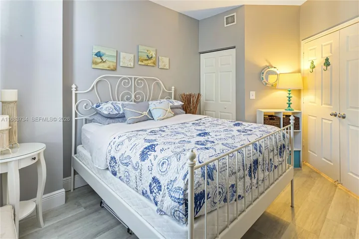 Second bedroom with wide doors, engineered wood flooring and closet space.651 Okeechobee Blvd., Unit #202, West Palm Beach, FL. City Place Tower Condominium. For Sale.