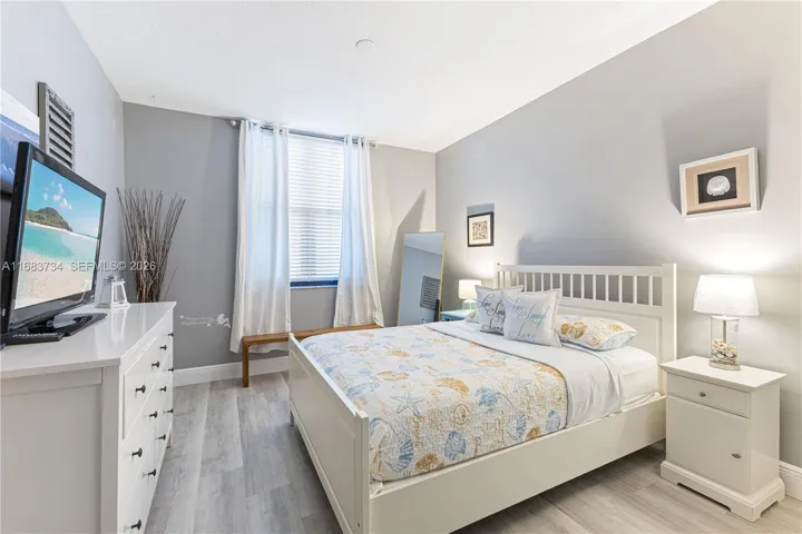 Main Bedroom, fully furnished, inviting for a good night's sleep.651 Okeechobee Blvd., Unit #202, West Palm Beach, FL. City Place Tower Condominium. For Sale.