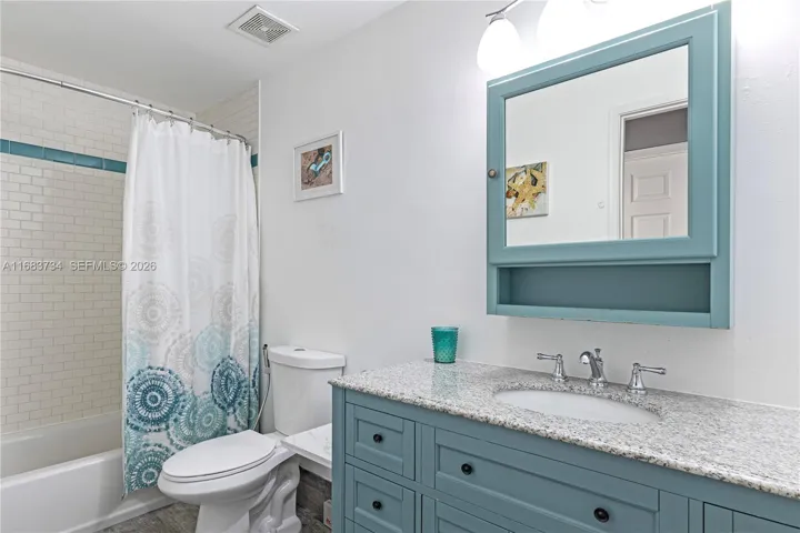Updated Bathroom with shower/tub combination.651 Okeechobee Blvd., Unit #202, West Palm Beach, FL. City Place Tower Condominium. For Sale.