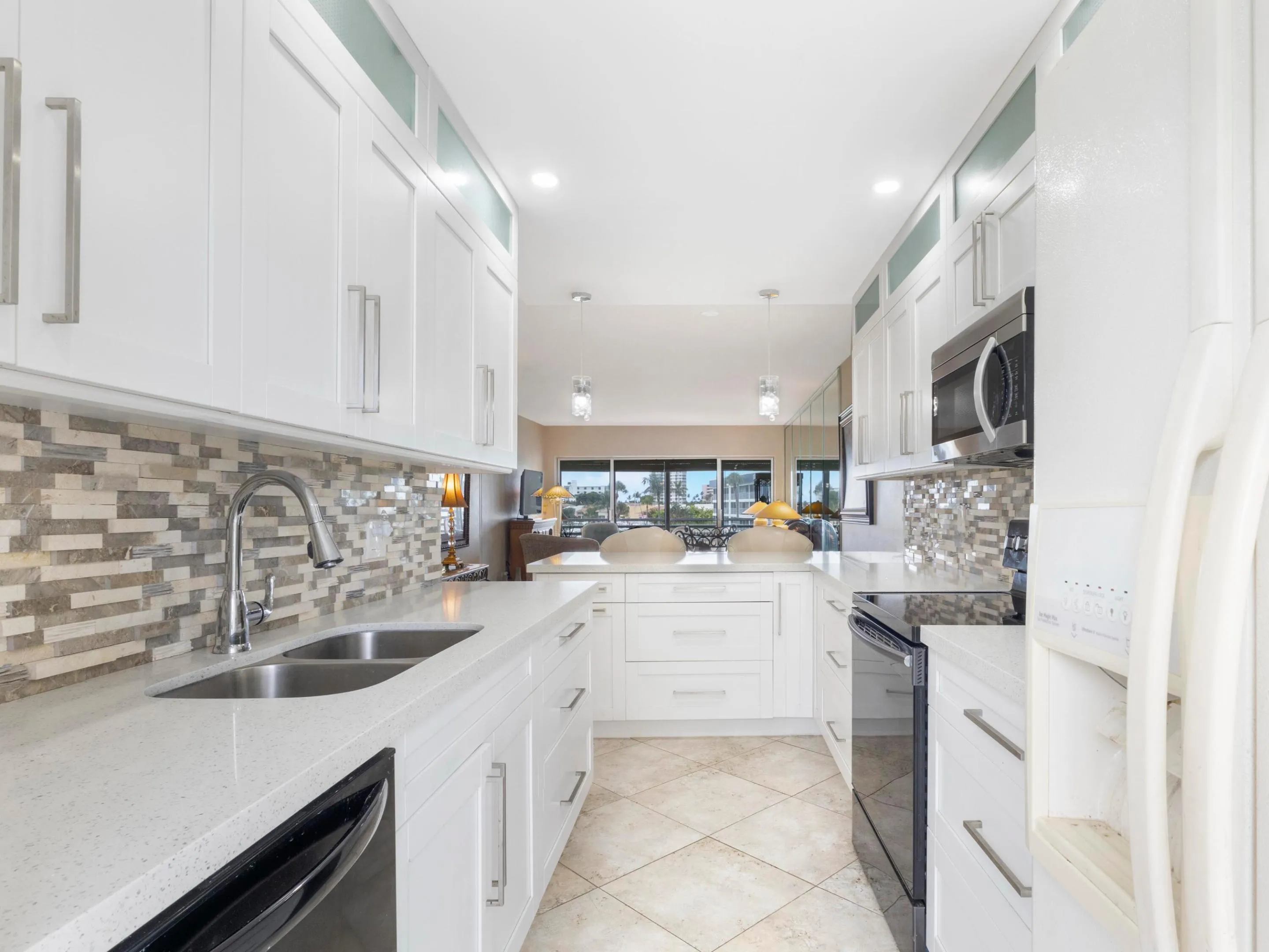 Ample cabinet and countertop space open design perfect for entertaining guests