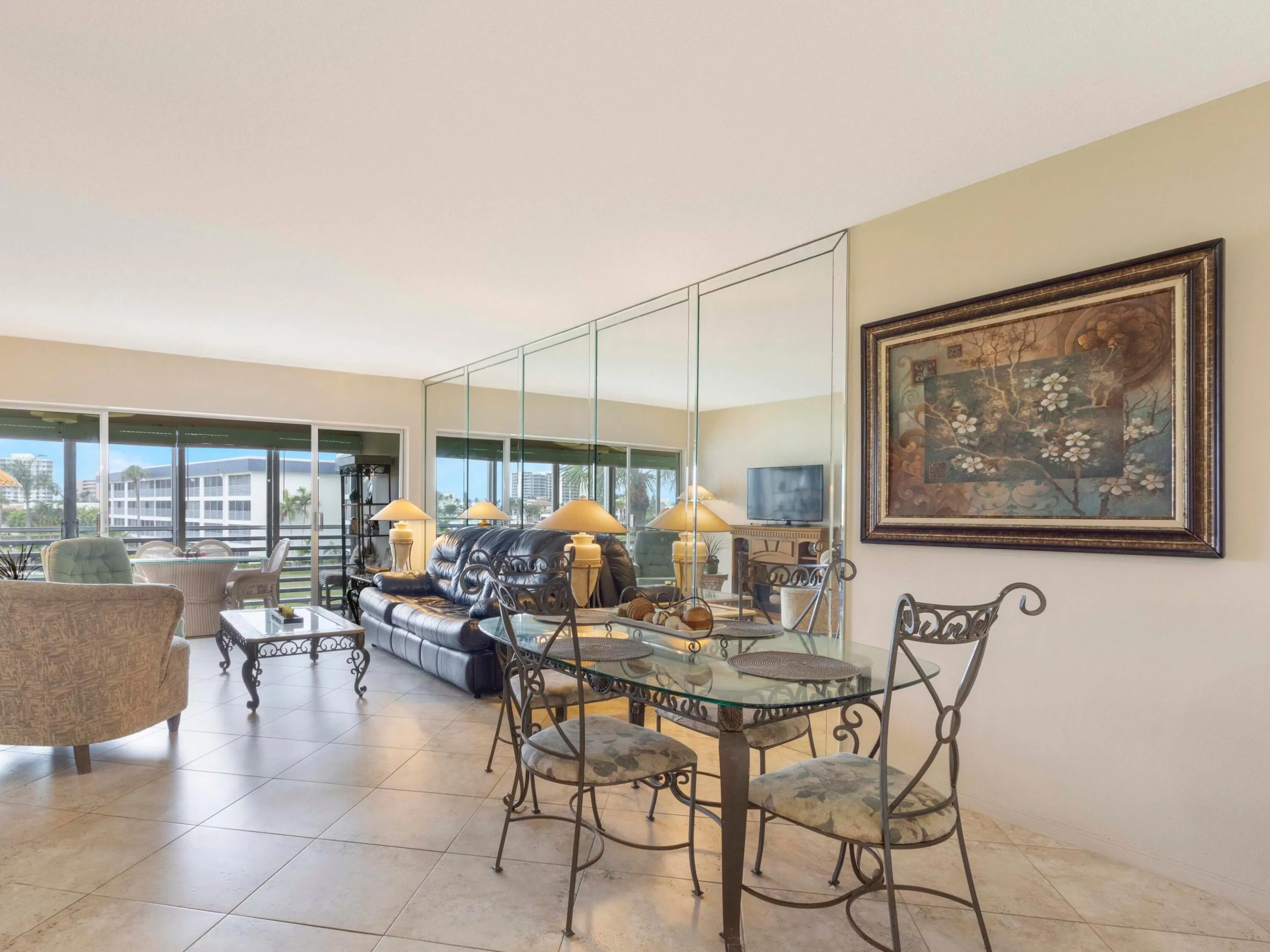 Open dining area connects to spacious living room, creating a bright, airy layout ideal for entertaining or relaxed everyday living