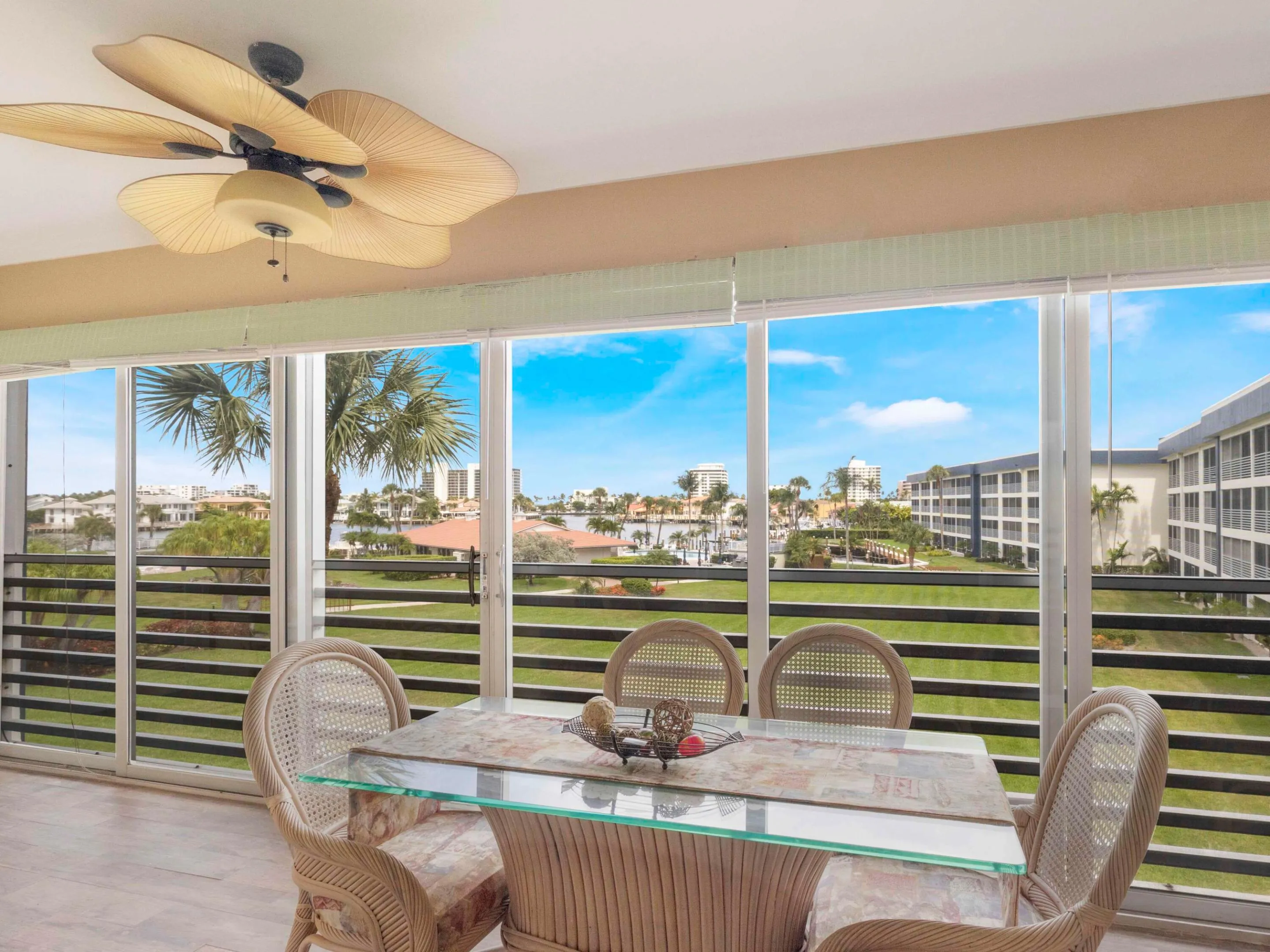Enclosed balcony with views of marina perfect for relaxing or entertaining while enjoying the coastal breeze