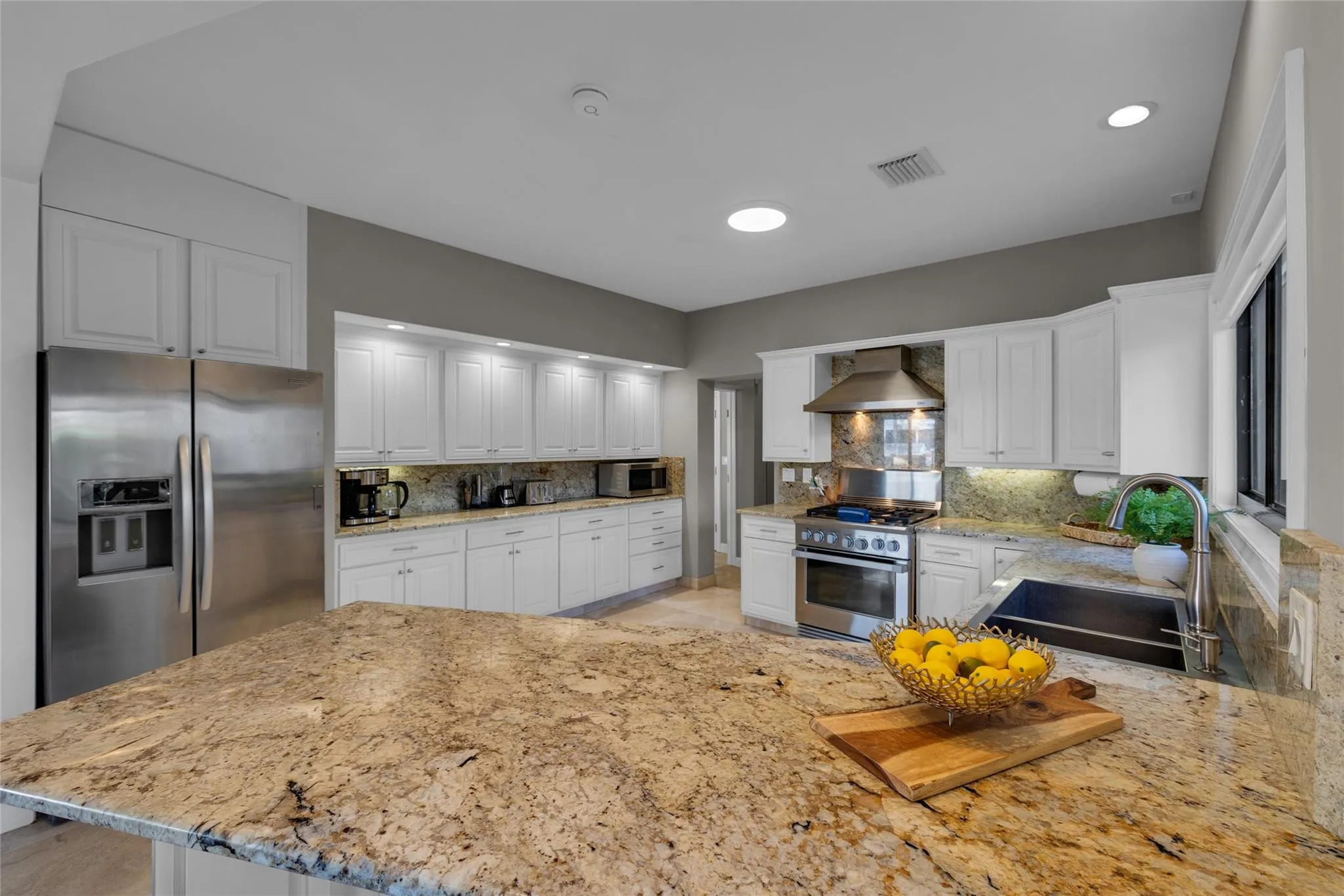 Beautiful chef's kitchen with stainless steel appliances