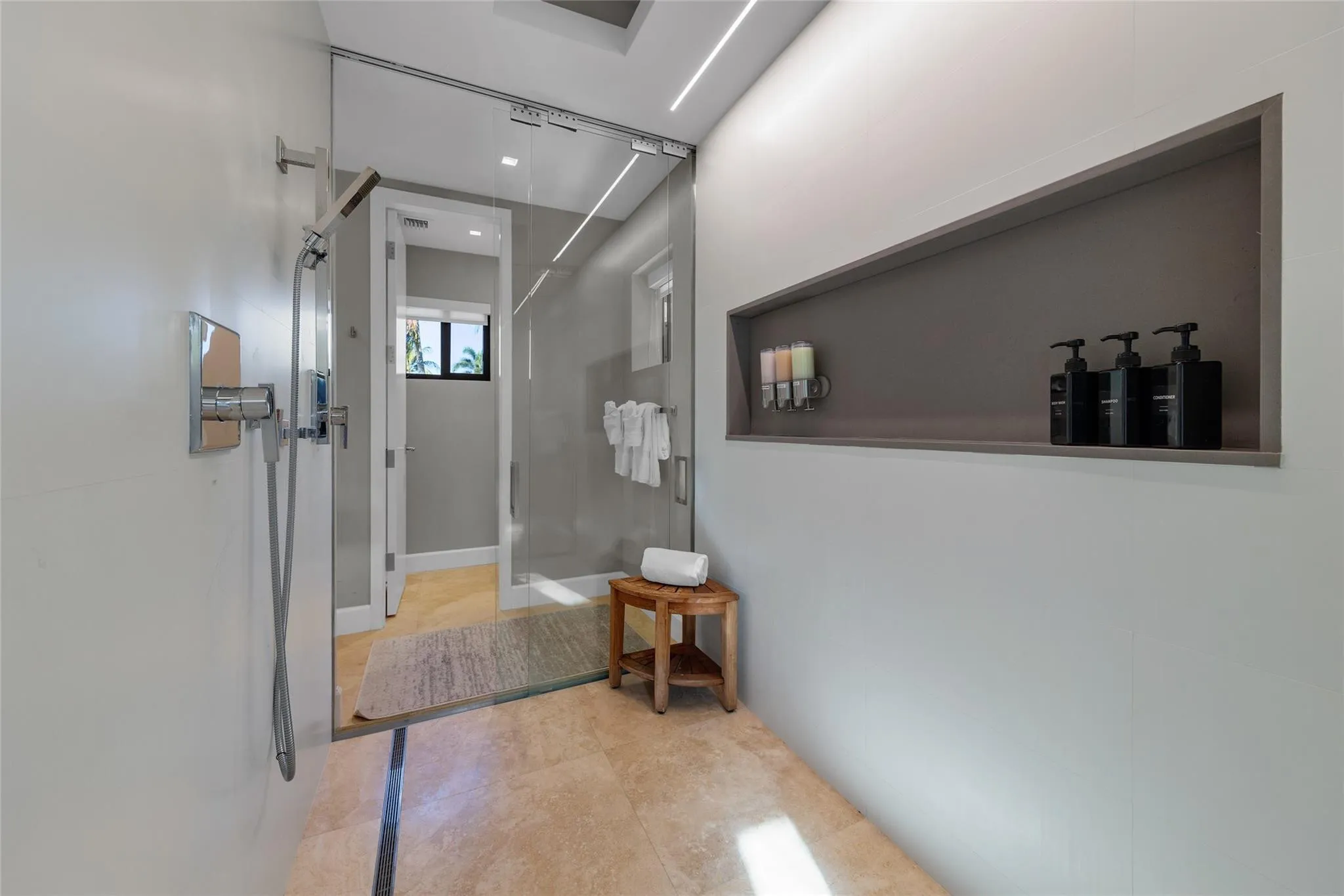 Primary Bathroom with 2 Toilet Closets, Dual Shower and Dual Sinks.