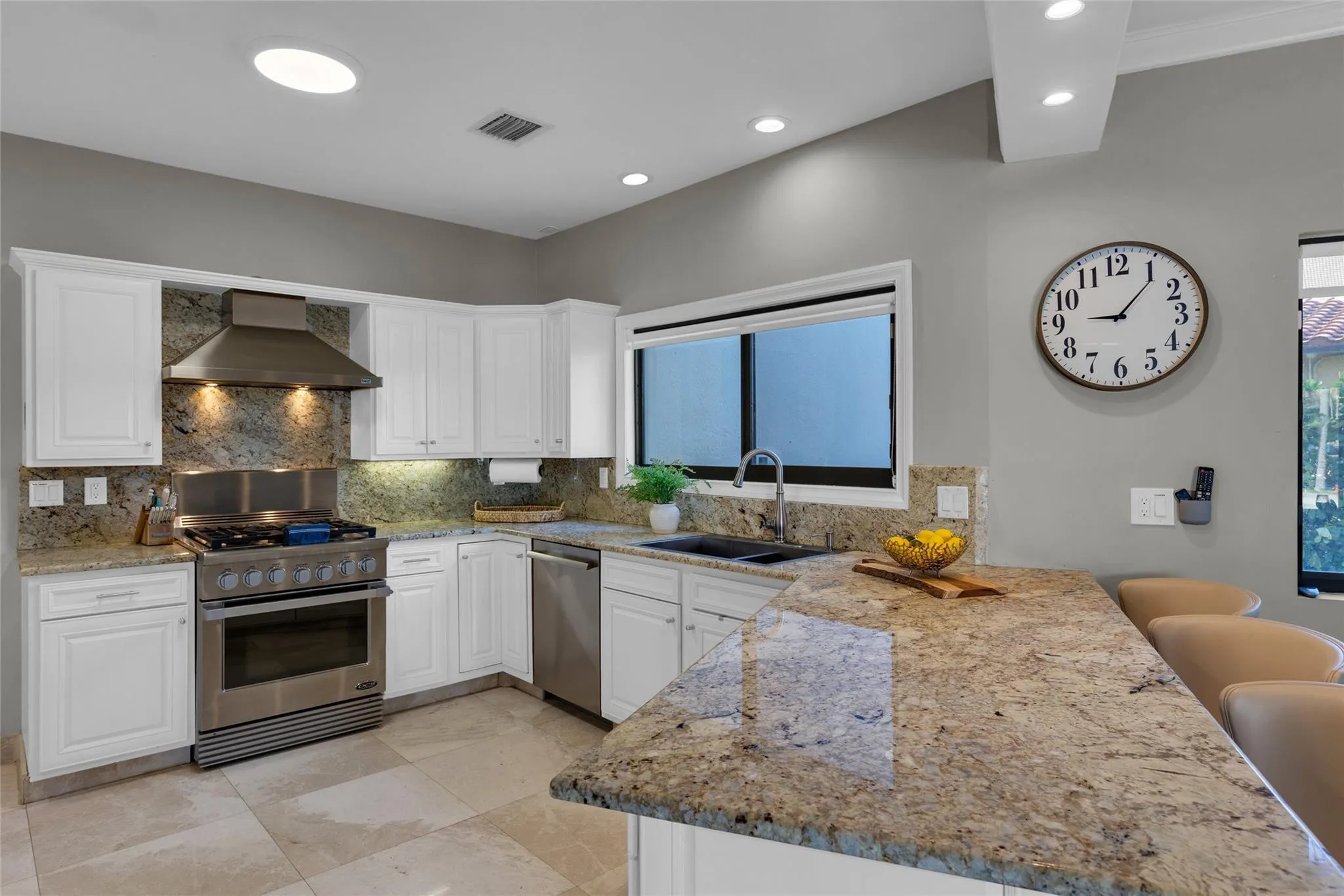 Beautiful chef's kitchen with stainless steel appliances