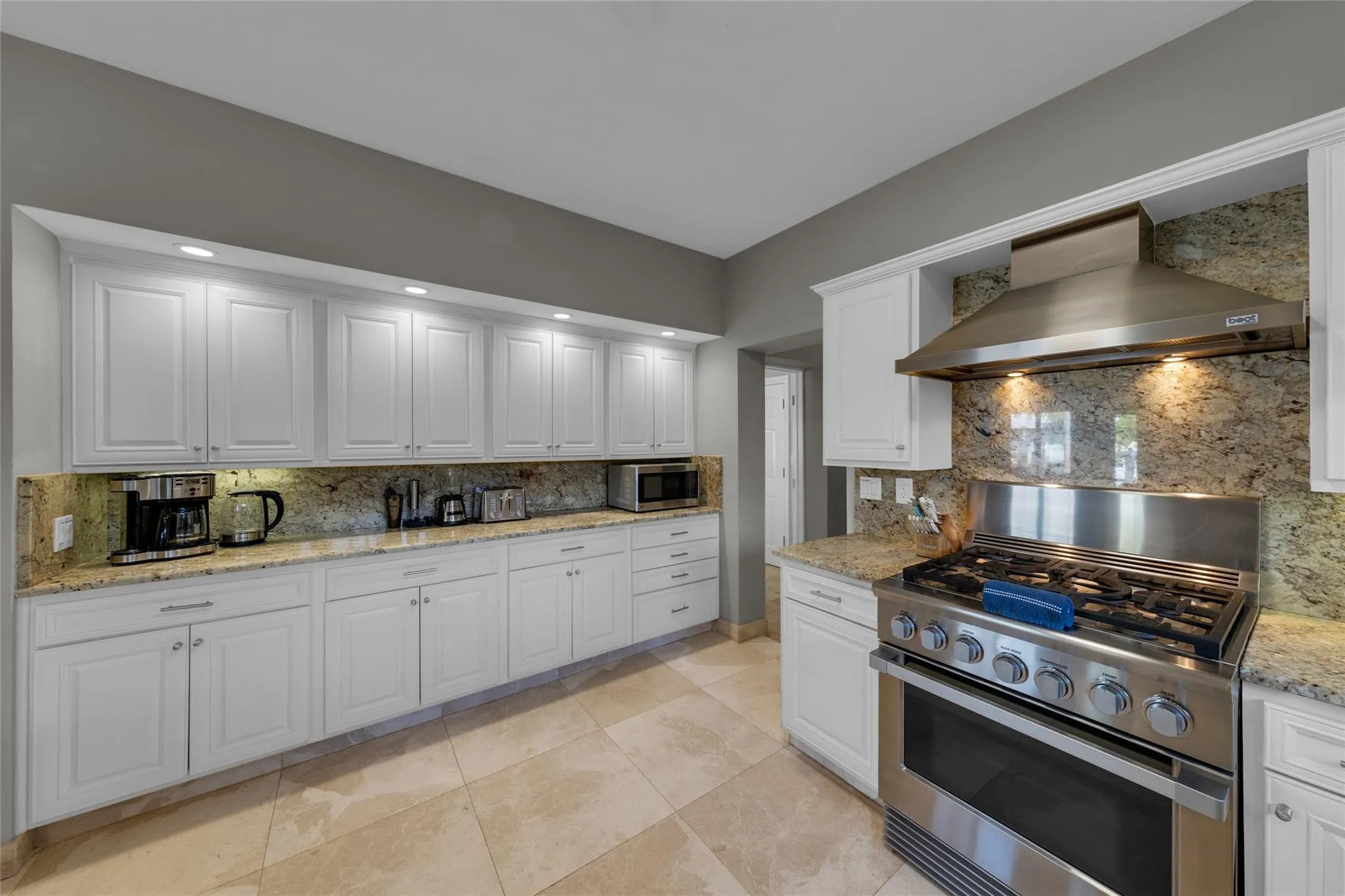 Beautiful chef's kitchen with stainless steel appliances