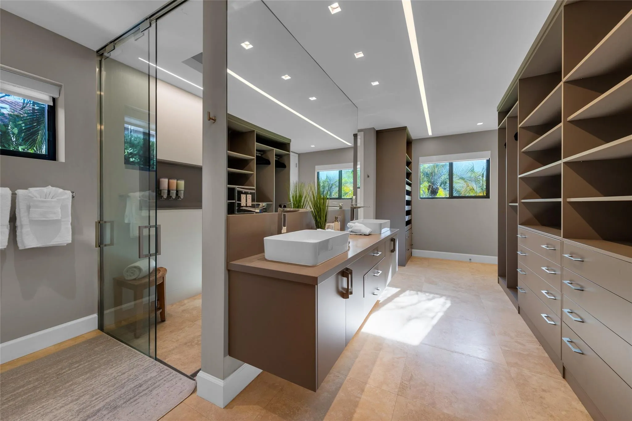 Primary Bathroom with 2 Toilet Closets, Dual Shower and Dual Sinks.