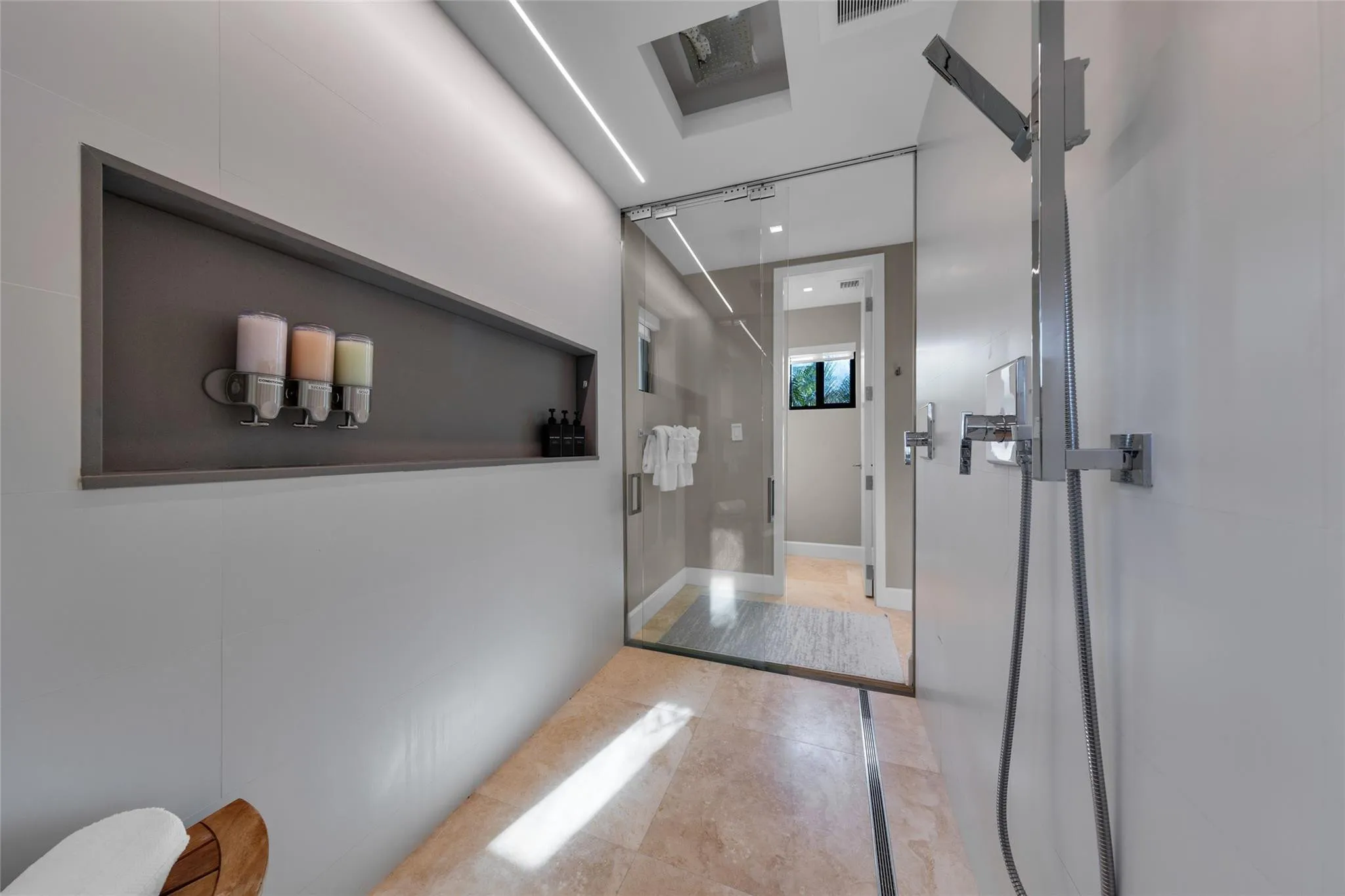 Primary Bathroom with 2 Toilet Closets, Dual Shower and Dual Sinks.