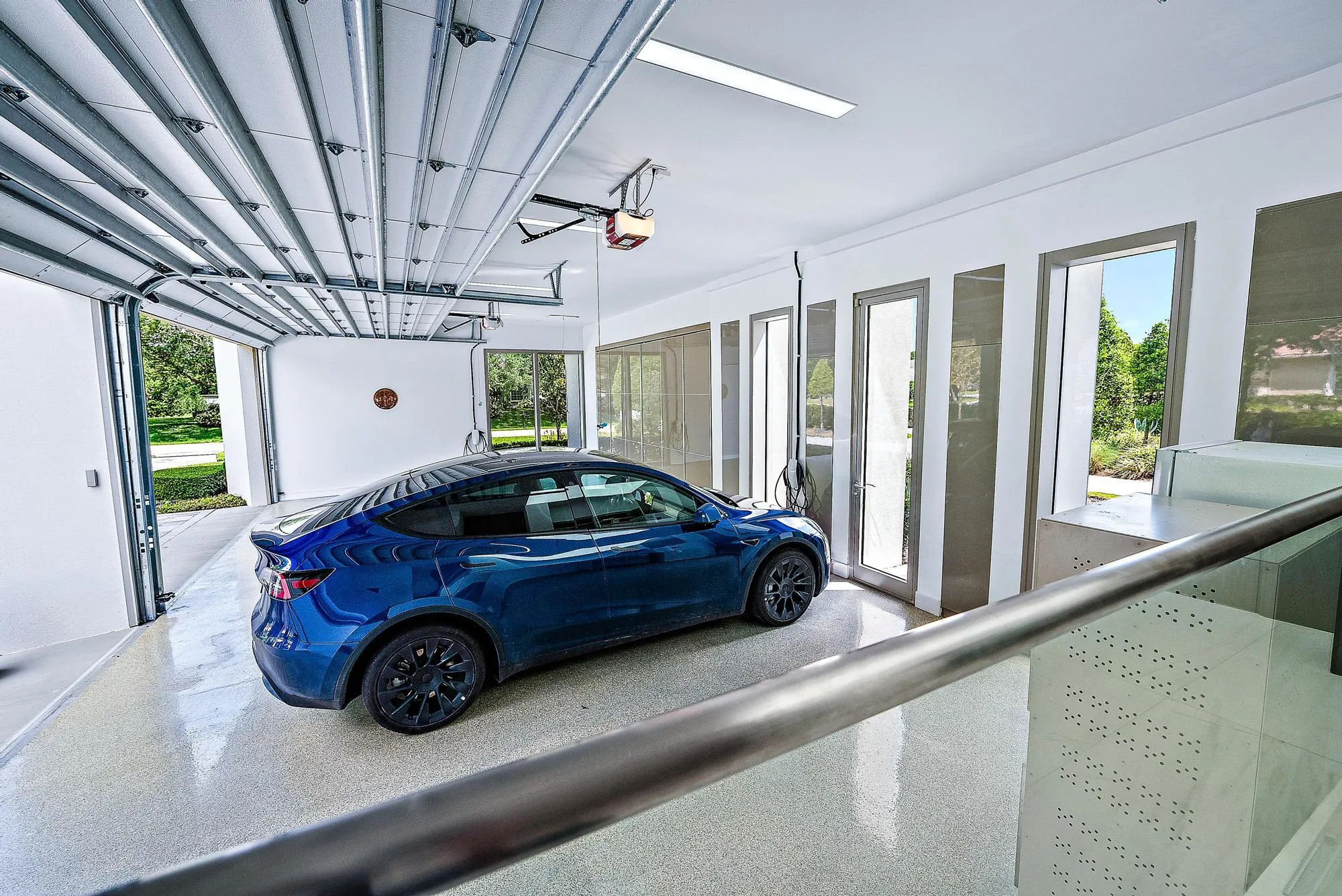 Expansive 4 car garage with storage