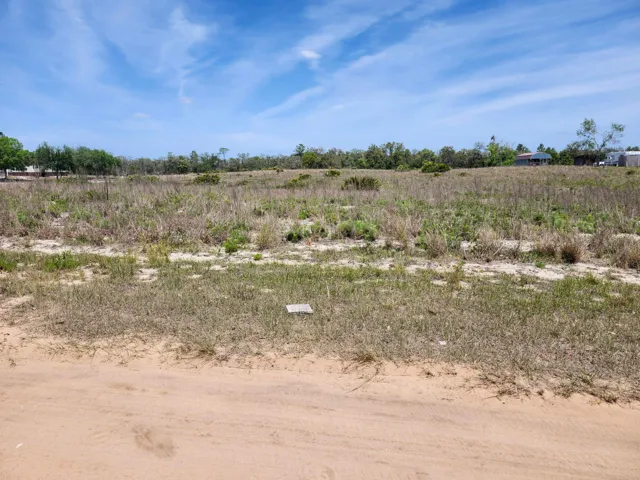 Directly in front of lot