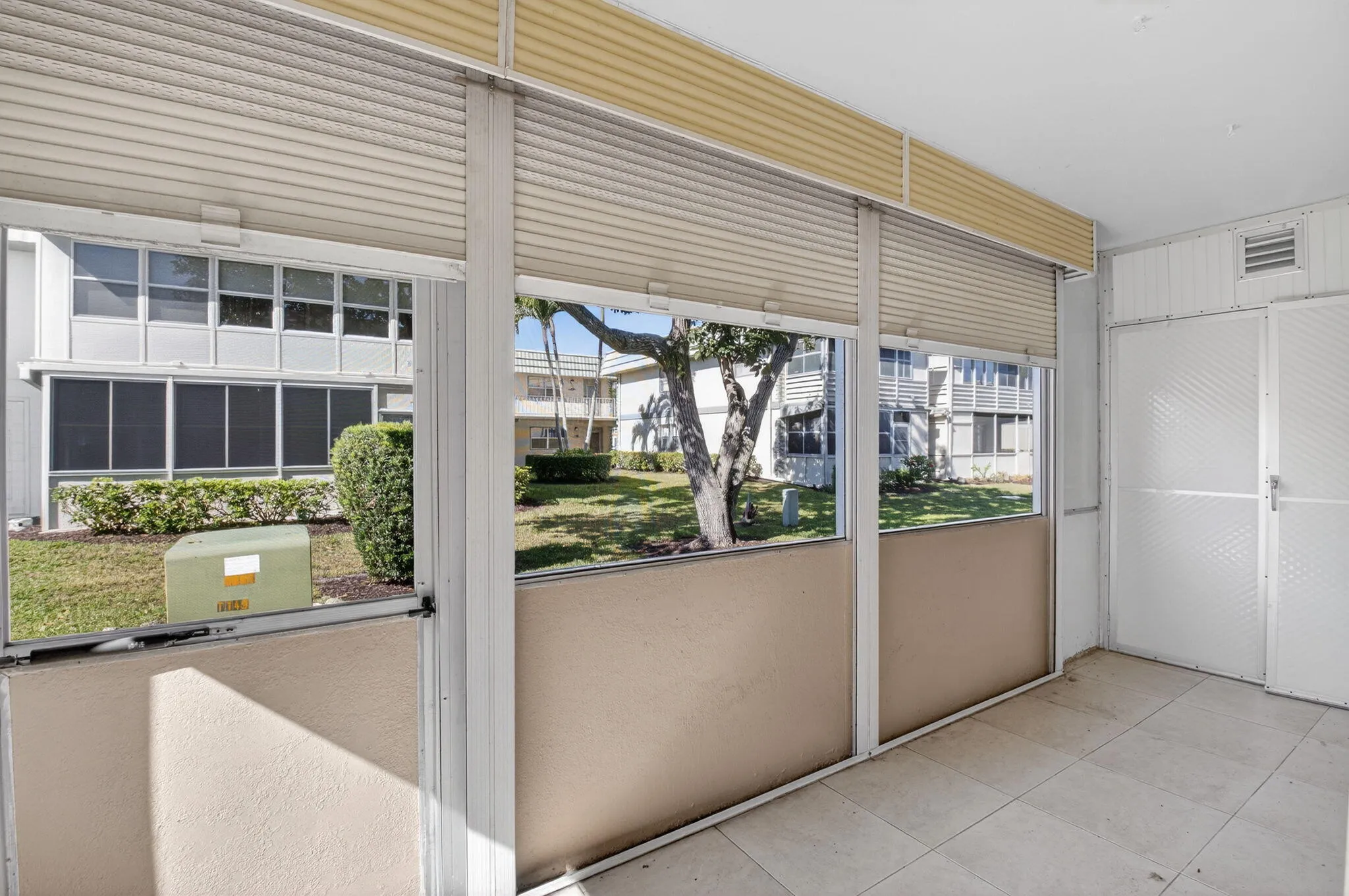 GARDENT VIEW FROM THE PATIO - ROLL DOWN SHUTTERS