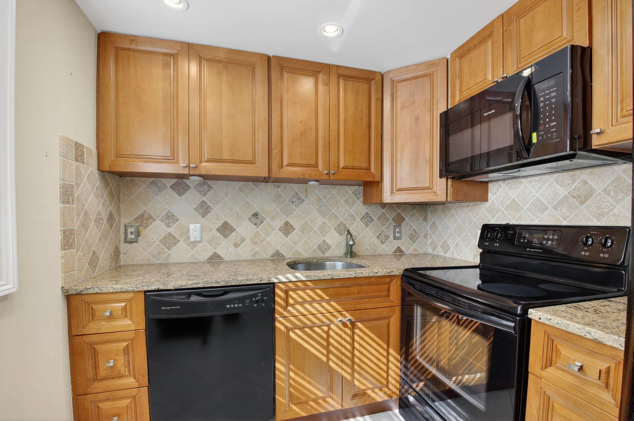 GRANITE COUNTER AND MARBLE BACK SPLASH