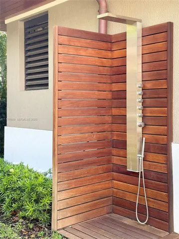 Outdoor shower by outdoor kitchen
