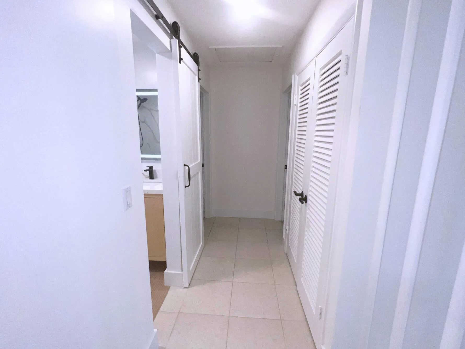 Hallway w large linen closet
