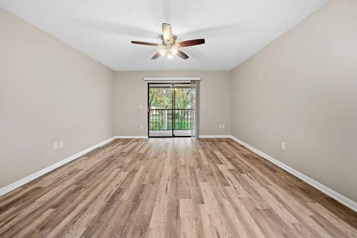 Primary w/covered & screened balcony
