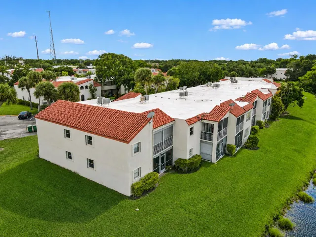 First Floor Corner Unit Offers Yard Space and Privacy