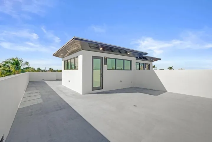 Rooftop Terrace — Private third-floor sanctuary with east, west, and northern exposures. Accommodates future needs such as generator placement and elevated mechanical equipment—enhancing resilience while preserving outdoor living below.
