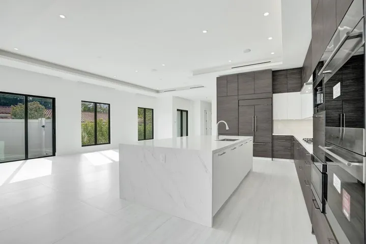 Entertaining Flow is Natural, as the kitchen is aligned with the dining and living areas for seamless first-floor entertaining.