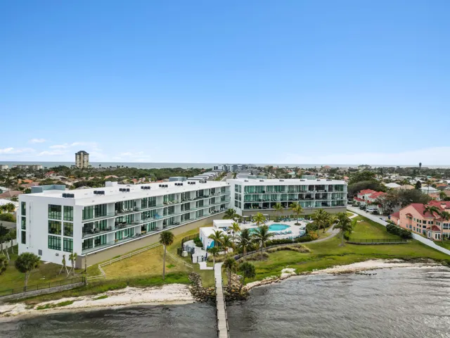 Community Pier with Marina/Docks on riverside.