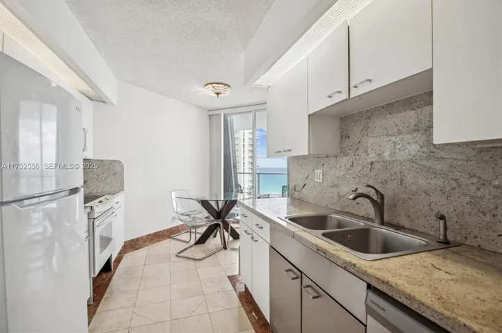 Walkthru Kitchen with Breakfast Area and Ocean Views.