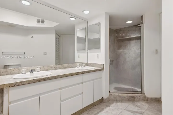 Spacious Primary Bathroom w/ Dual Sinks, Standup Shower and Separate Tub.