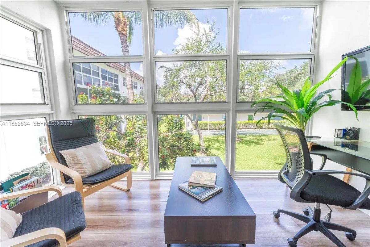 Florida Room overlooking relaxing courtyard