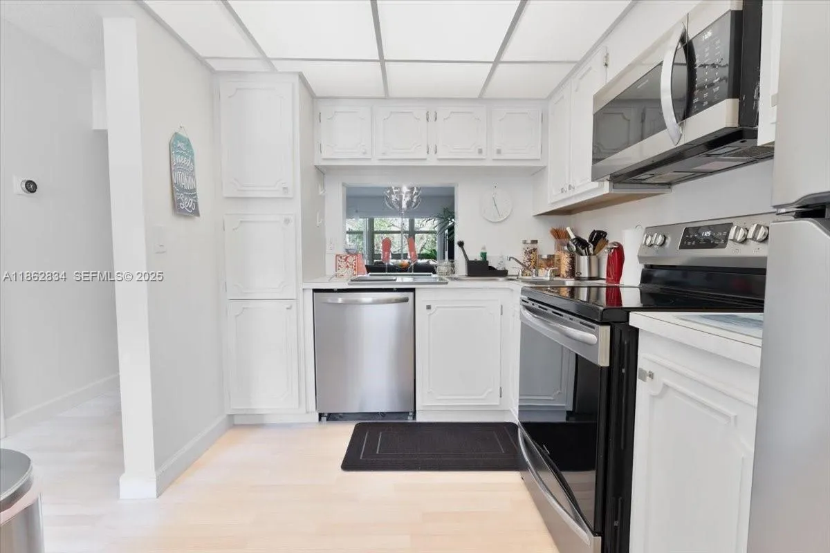 Fully equipped kitchen with stainless steel appliances