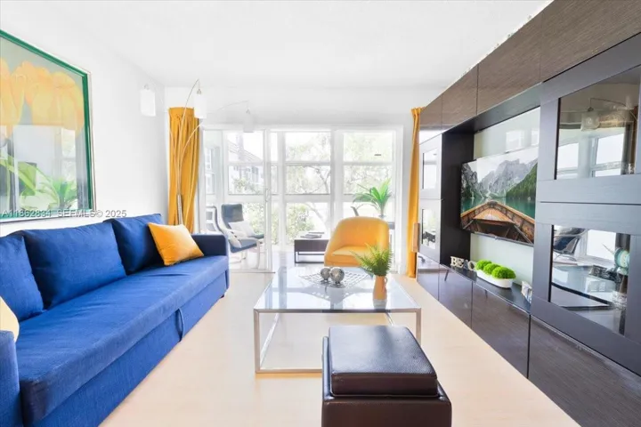 Living room has sliding doors to separate Florida room if privacy is needed