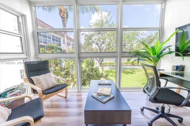 Florida Room overlooking relaxing courtyard