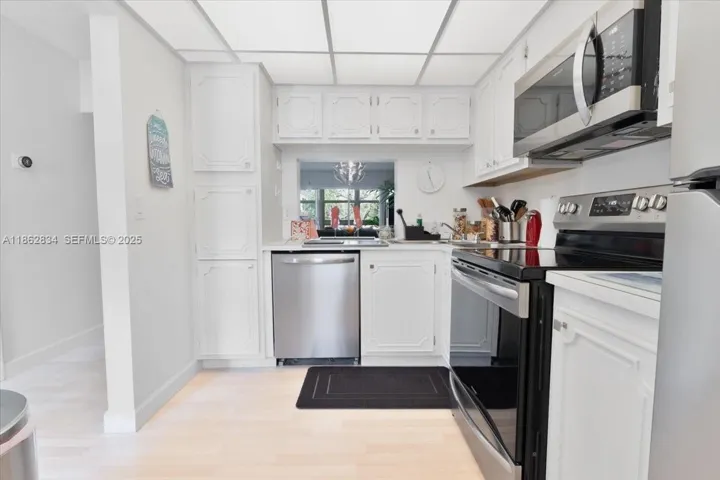 Fully equipped kitchen with stainless steel appliances