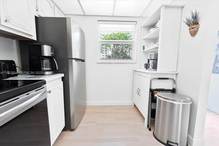 Kitchen facing east window, plenty of light