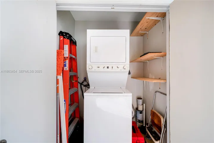 Washer and dryer inside the unit.