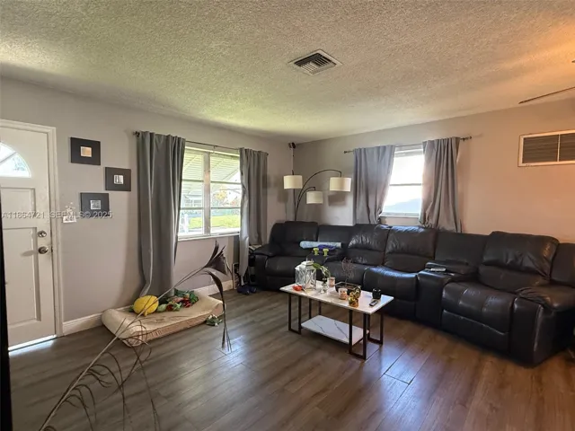 View of the Living Room from the Hallway leading to the bedrooms