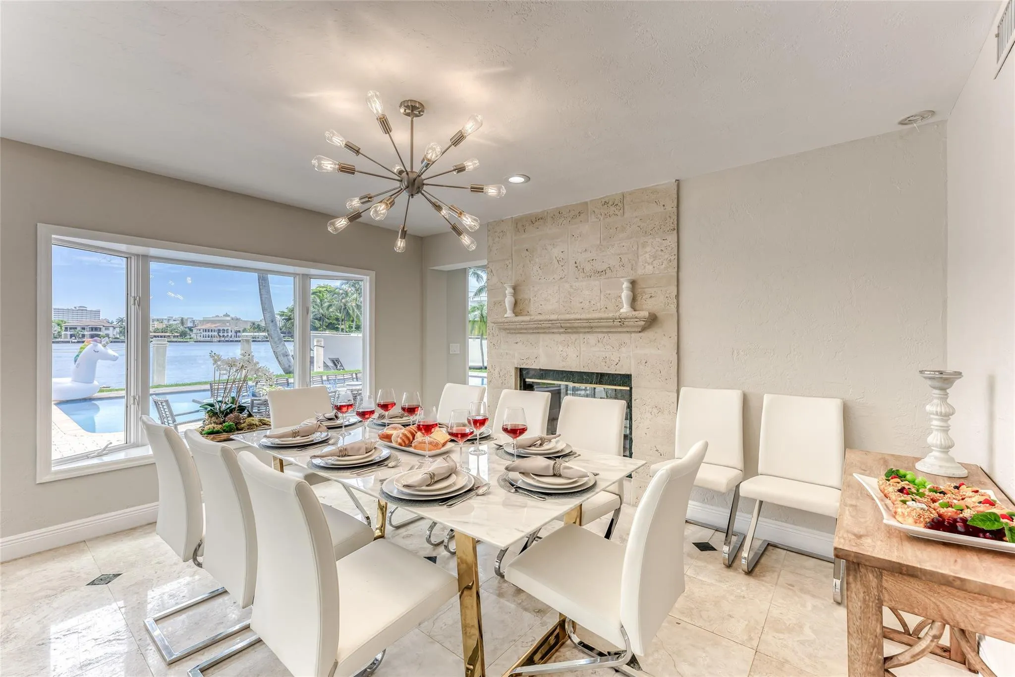 Dining Room Seating for 8 of Kitchen overlooking pool & waterway.