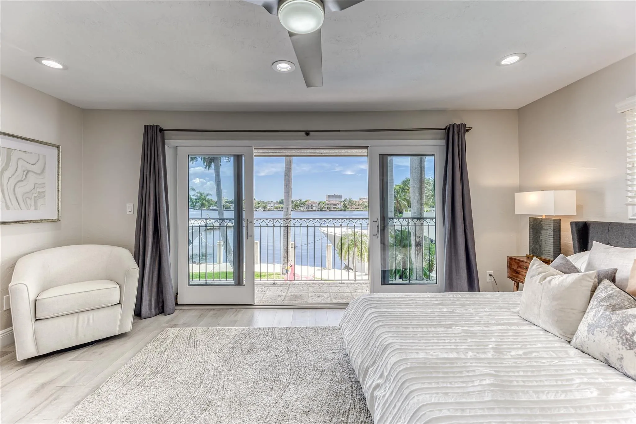 BEDROOM #2 (Upstairs) KING Size with balcony overlooking waterway with en suite bathroom, shower, smart TV