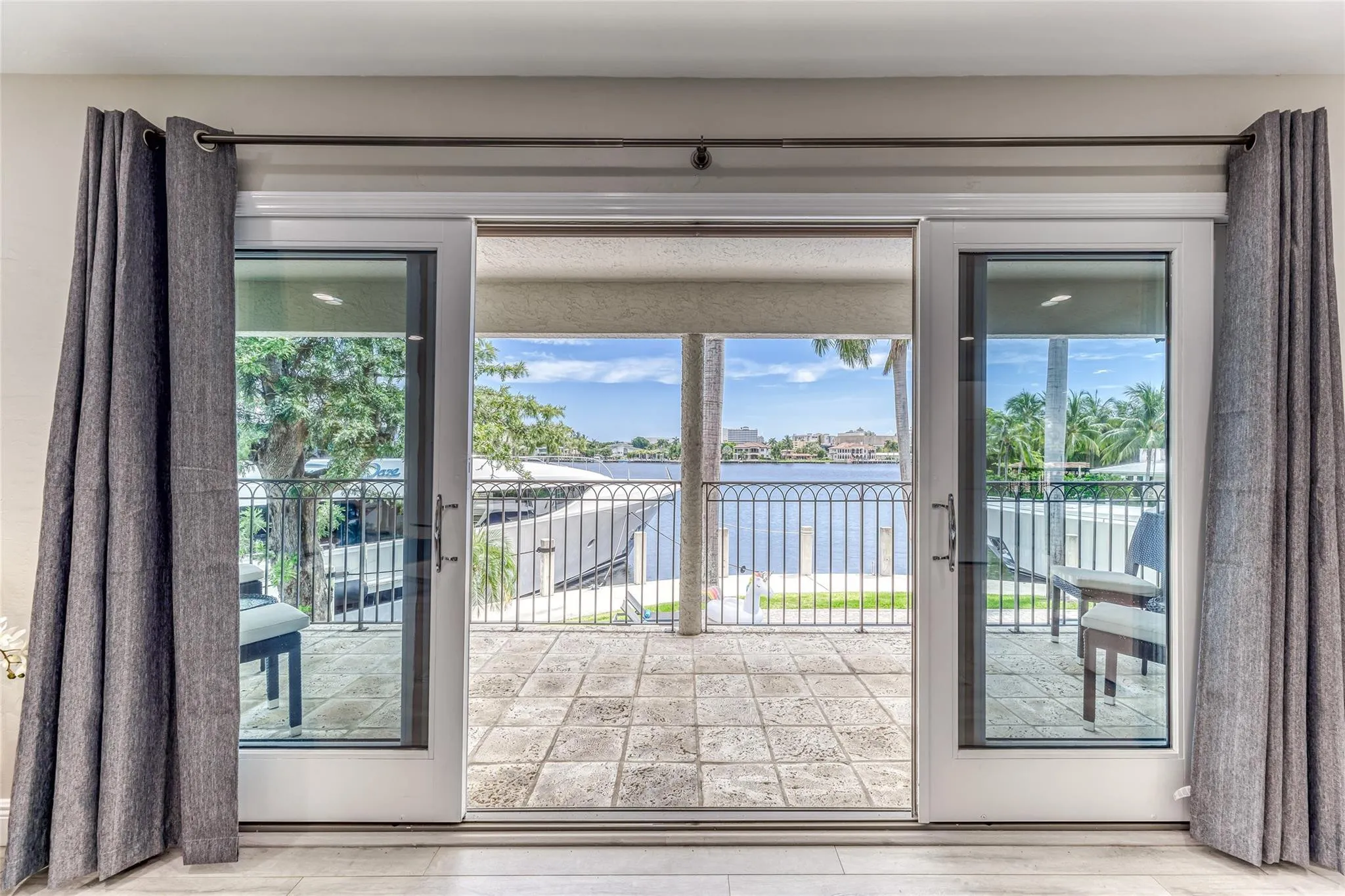 BEDROOM #1 (Upstairs) KING Size with Balcony overlooking waterway, En Suite bathroom w jacuzzi tub & seperate shower, Walk in closet, Smart TV