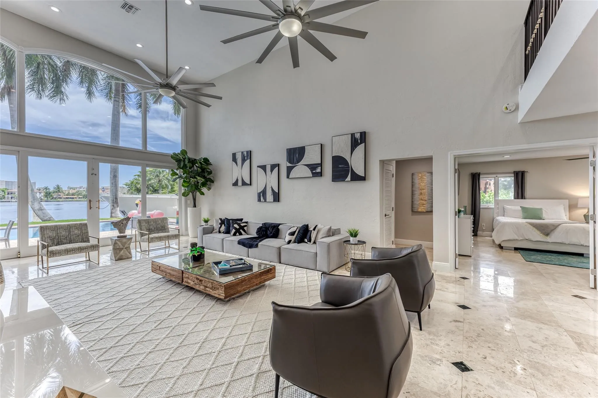 Open Layout Family Area overlooking Waterway & Pool Area