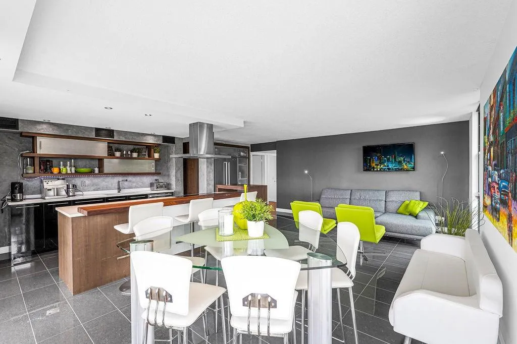 Triangular contemporary dining table & chairs.
