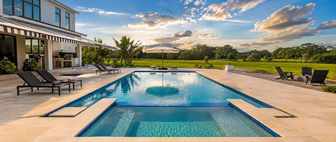 Luxury poolside retreat at sunset