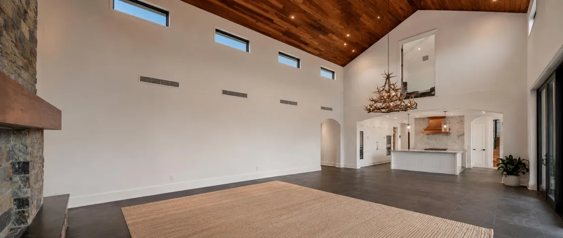 Spacious modern living with warm accents