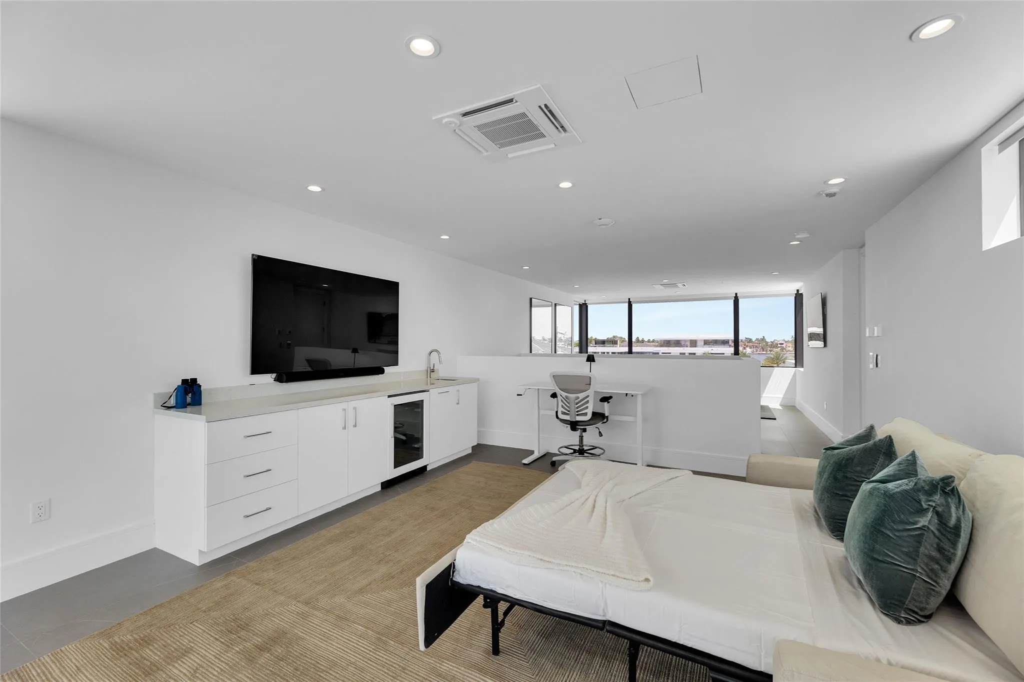 3rd Floor Den w/ Kitchenette & expansive balcony.