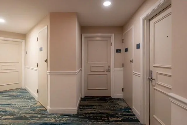 705 UNIT HALLWAY VIEW BY ELEVATOR