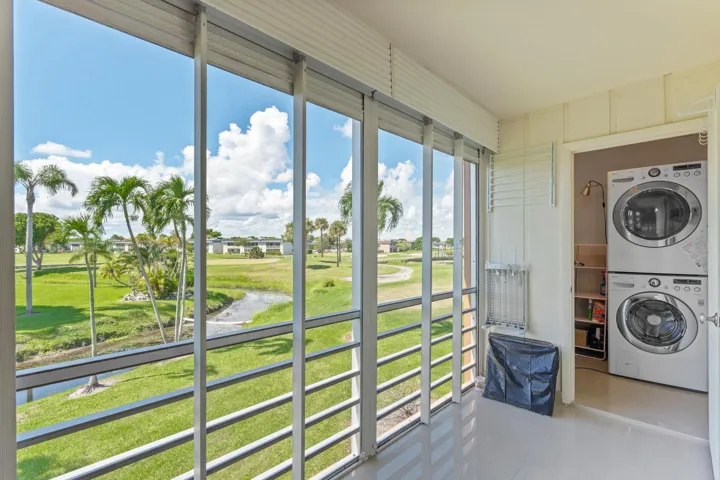 Balcony w/laundry and RARE SINK! Golf and Canal VIEWs