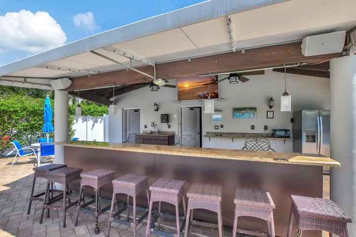 Great pool bar with BBQs & a place to clean your fresh catch