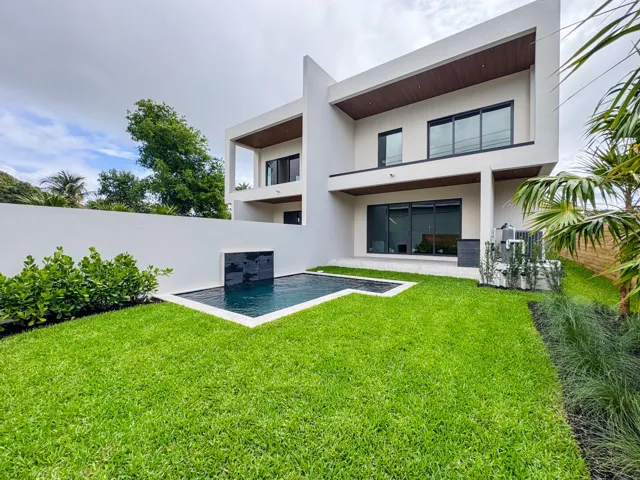 (as of April 8, 2026) west-facing backyard with privacy wall, 11x14 spa pool, and well landscaped