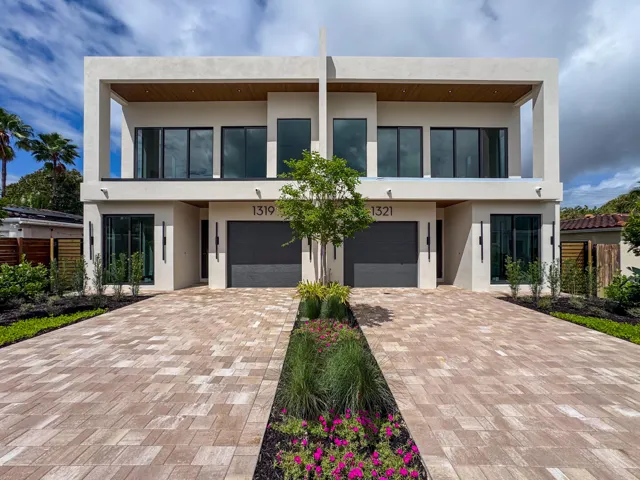 (as of April 8, 2026) Front elevation facing East. Beautifully landscaped. Modern with warm tones and dimension.