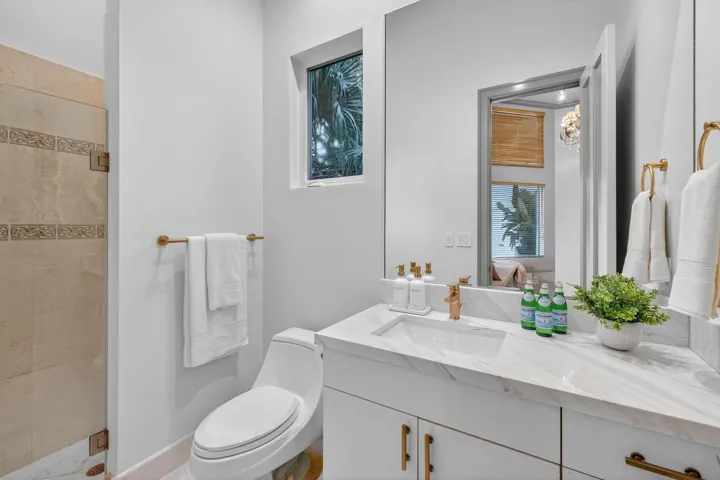 Front Front Bedroom Suite 2 - Bathroom New Stone Vanity Top with Kohler Brass Fixtures & Hardware