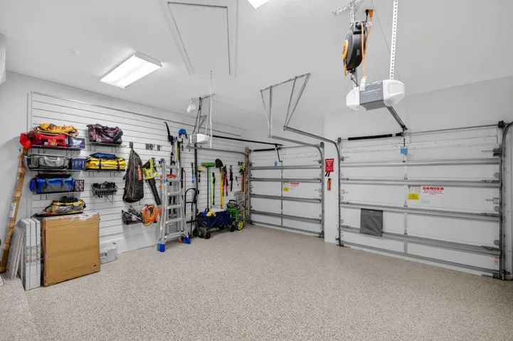 New Quiet Door Openers & Keypad Entry, Slat Wall Storage System & Polyaspartic Flooring